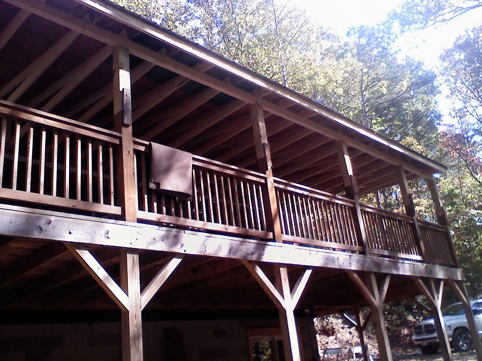 Timber framing under a new elevated porch and deck — Roof Leak Repair in High Ridge by Roofing Brothers